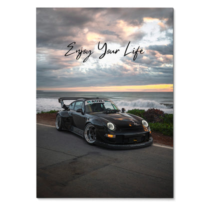Motivational poster featuring black RWB Porsche 911 with "Enjoy Your Life" text over sunset sky wall art.