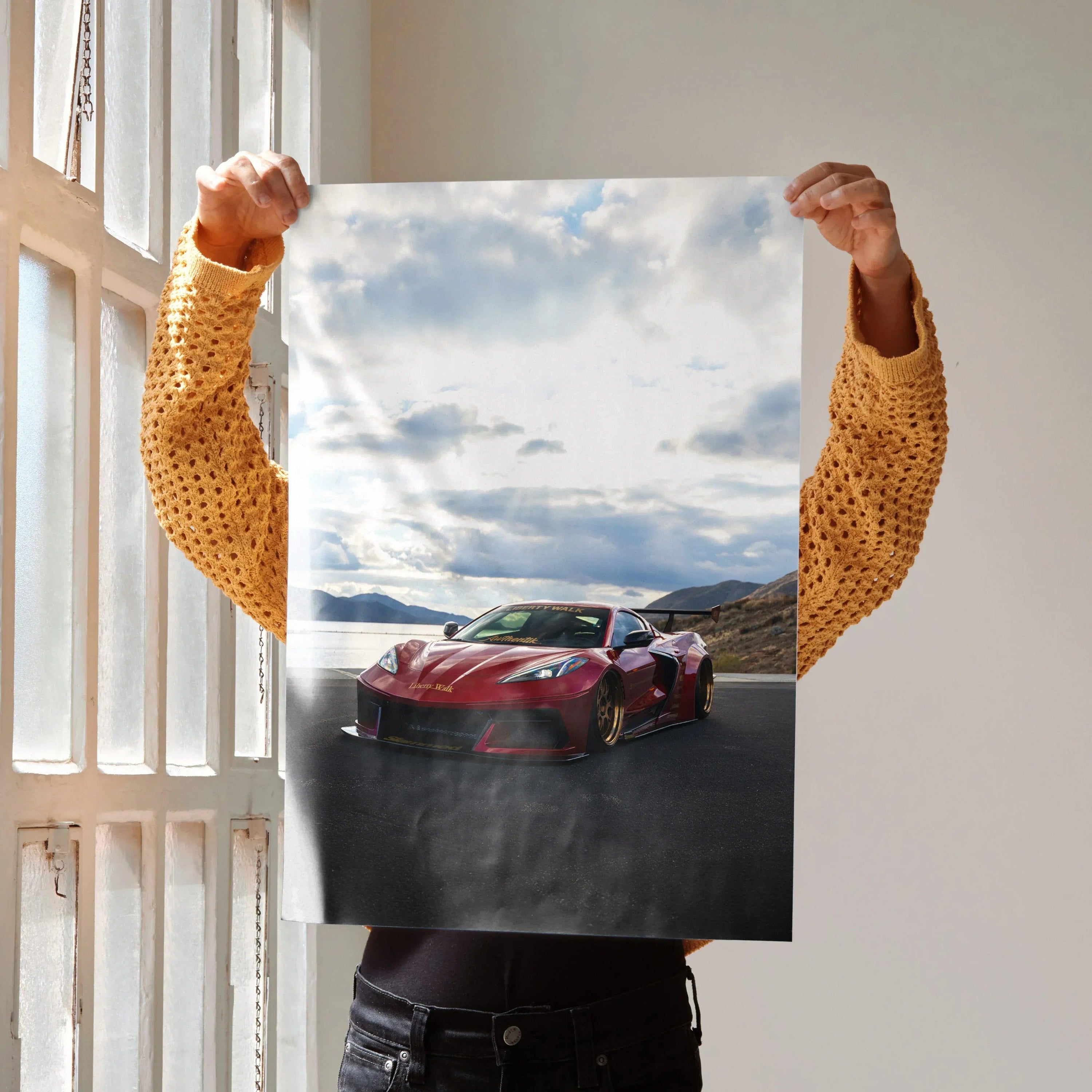 C8 Corvette red sports car on road under cloudy sky premium satin poster wall art.