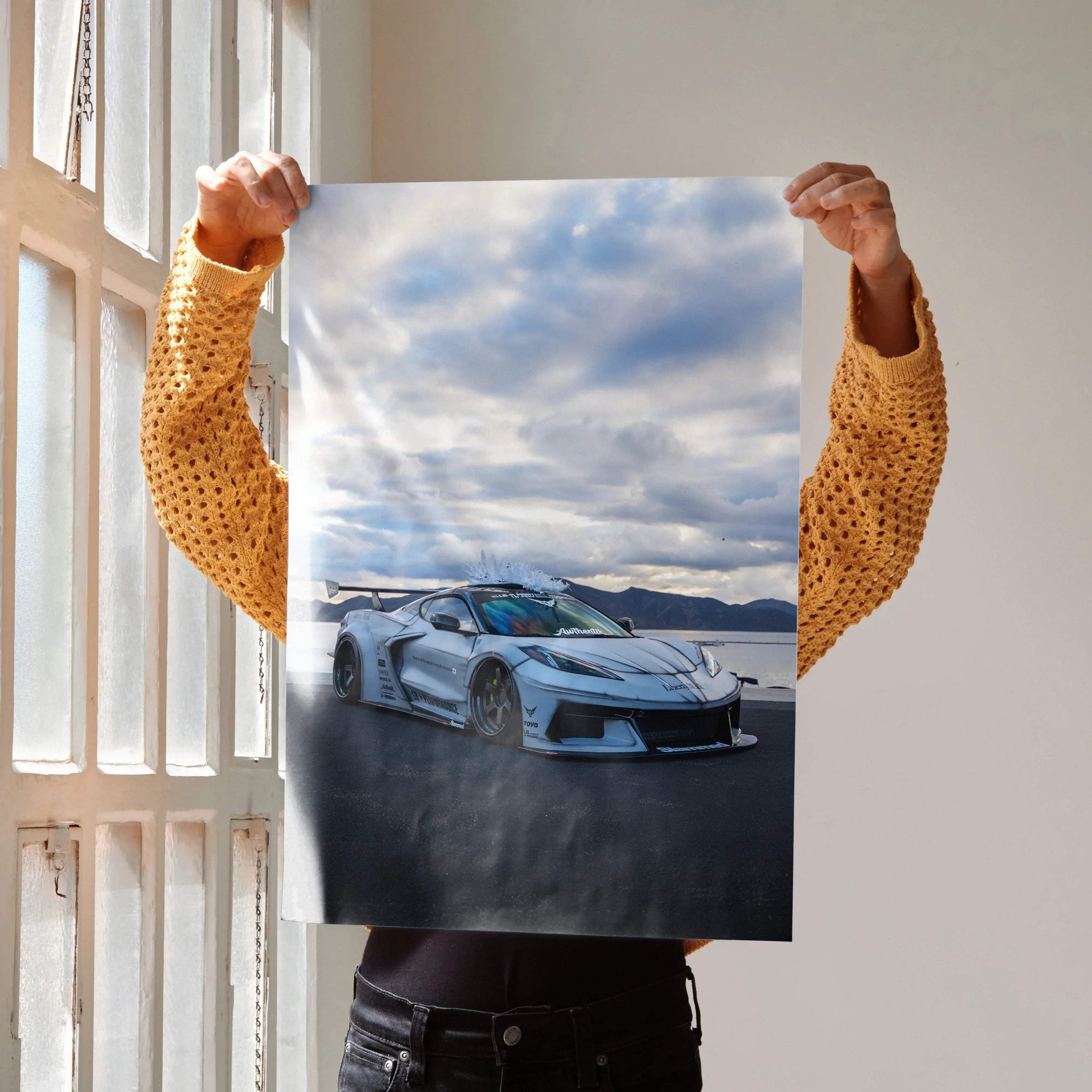Chevrolet C8 Corvette white sports car on road under dramatic sky poster wall art.