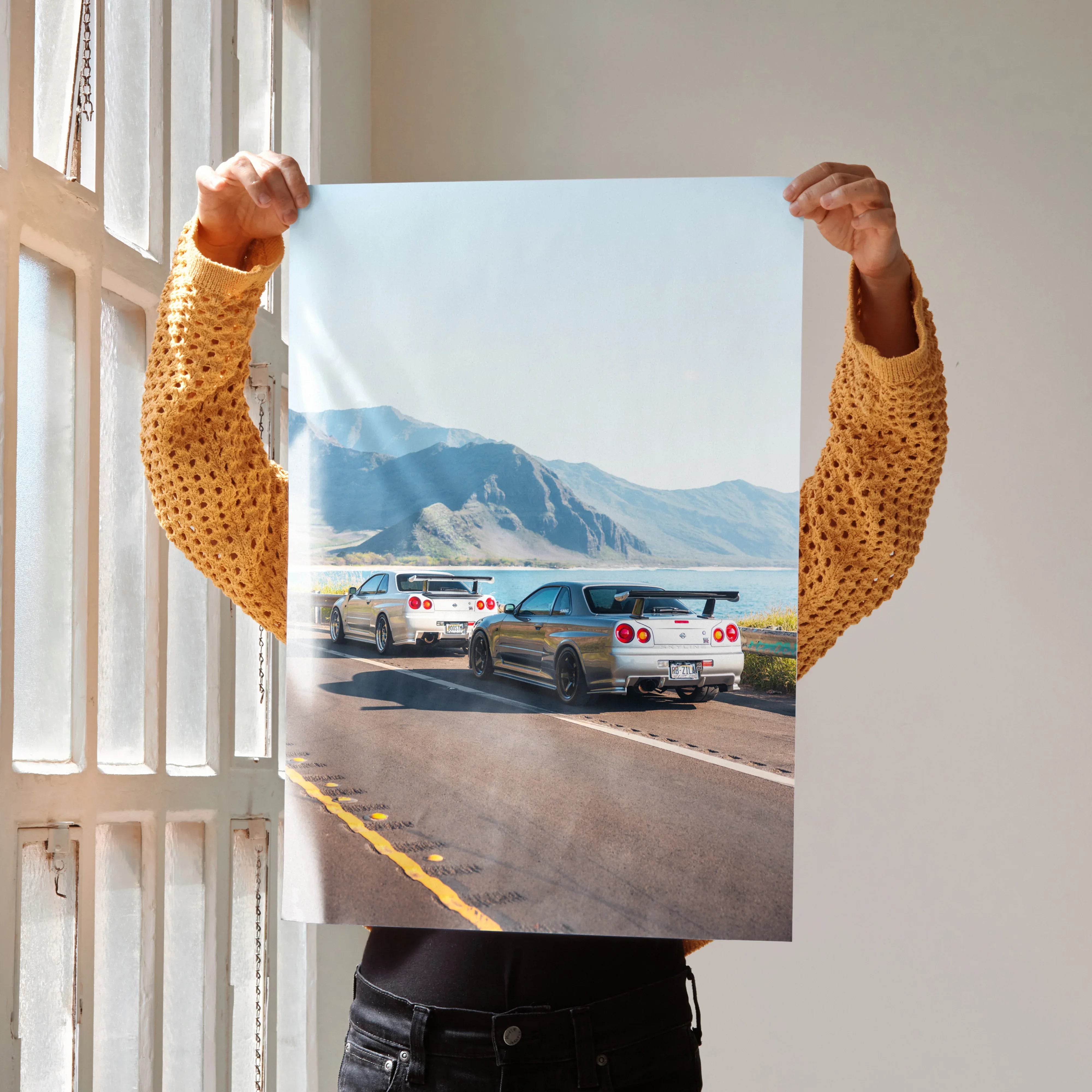 Nissan GT-R R34 Skyline driving on coastal road car poster wall art.