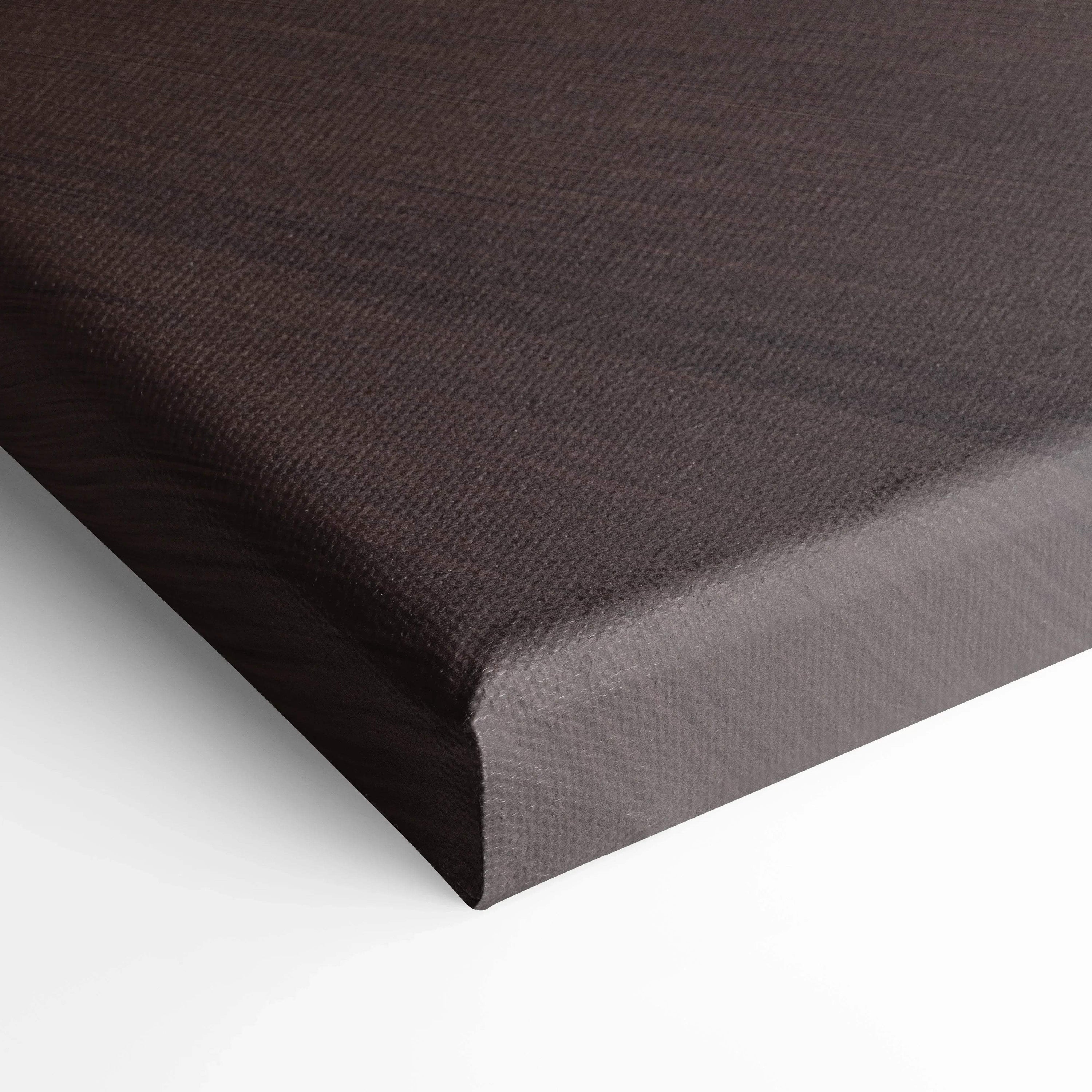 Close-up of dark gray textured canvas corner showcasing stretched fabric for wall art or canvas art print.