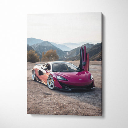 Pink McLaren 600LT with open vertical doors on mountain road canvas wall art.