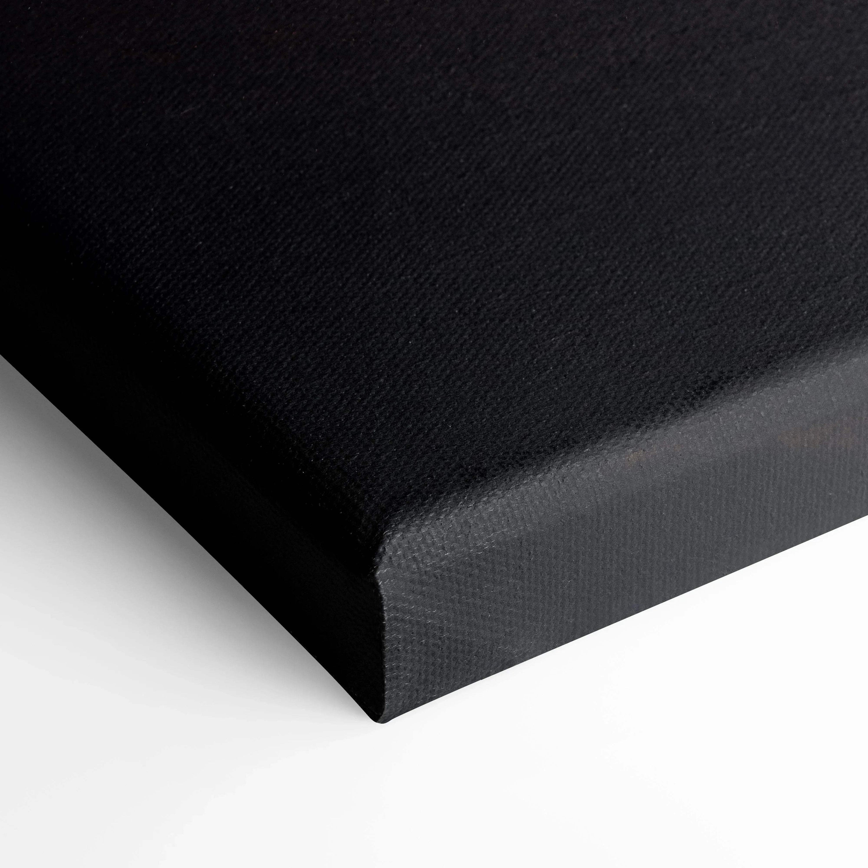Black textured canvas corner showcasing thick gallery wrap for wall art and canvas art quality display.