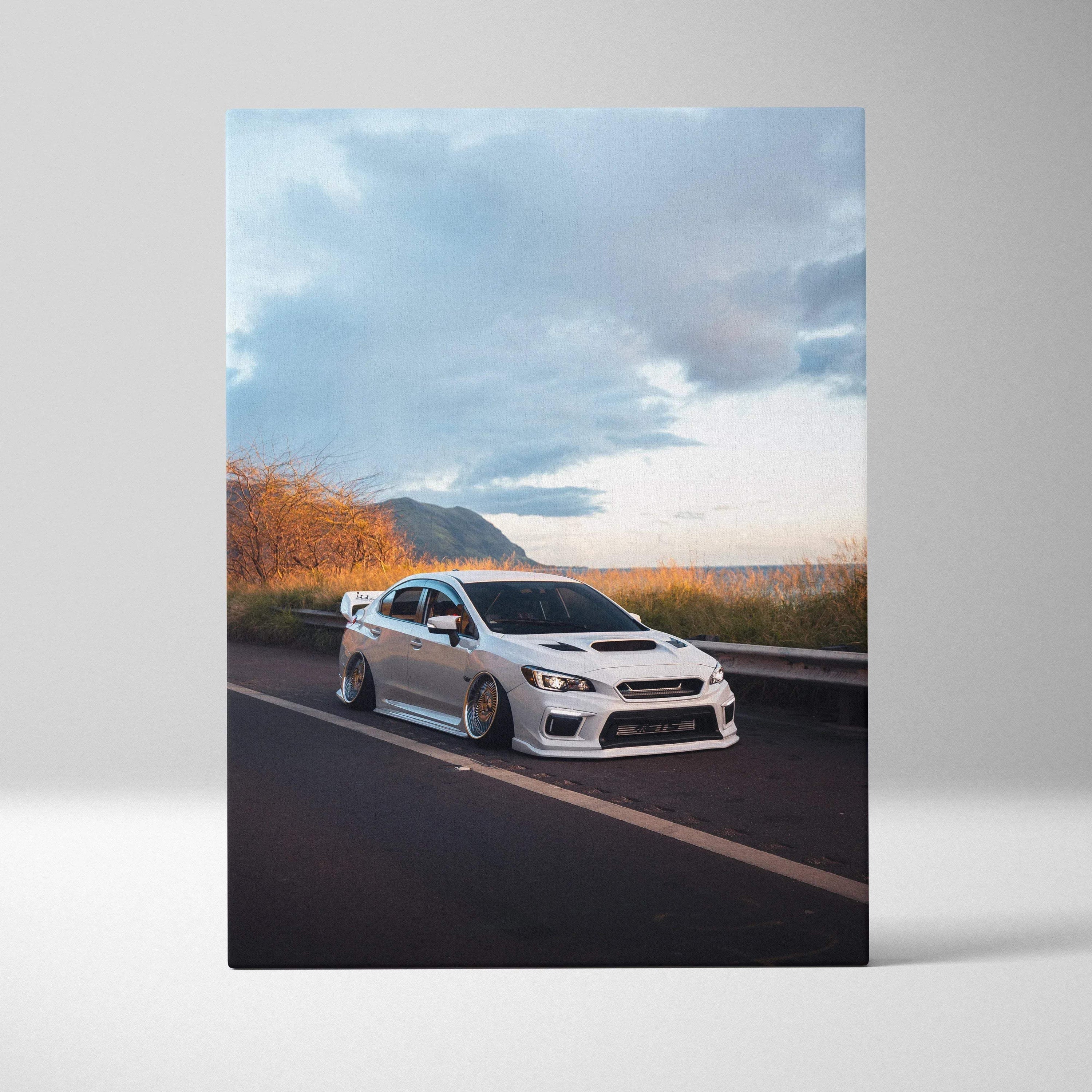 Subaru WRX STI parked on road with sunset sky, vertical canvas wall art print.