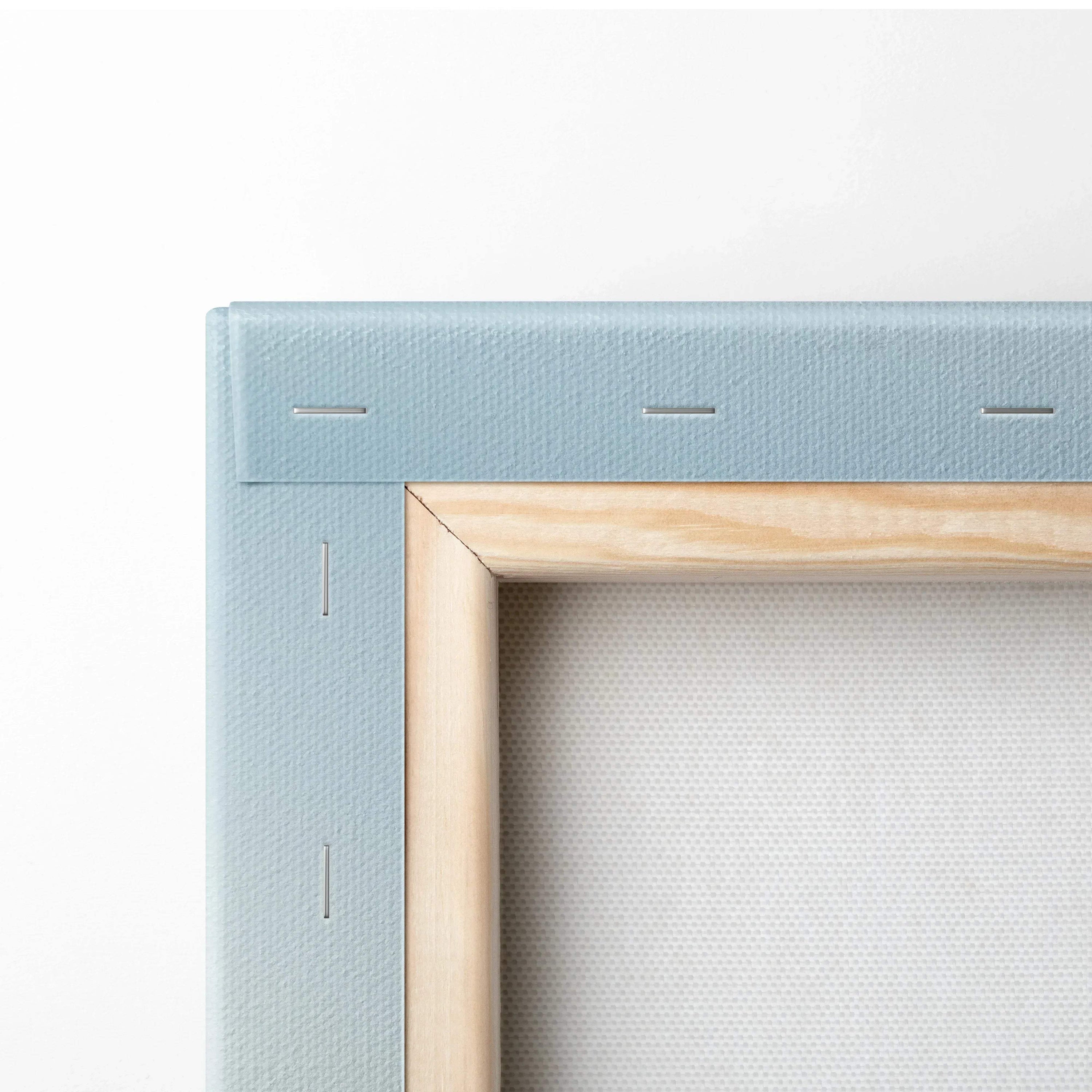 Close-up of wooden stretcher bars and canvas fabric on wall art canvas print frame.