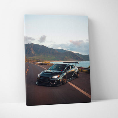 Subaru WRX STI driving on coastal road at sunset canvas wall art vertical canvas art print.