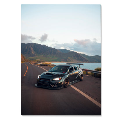 Black Subaru WRX STI parked on coastal road at sunset poster wall art.