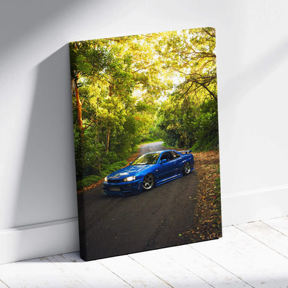Vertical canvas art of blue Nissan GTR R34 Skyline car on forest road, vibrant wall art print.