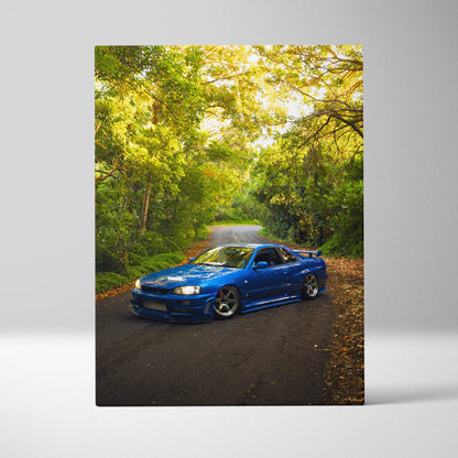 Blue Nissan GTR R34 Skyline on forest road vertical canvas wall art print.