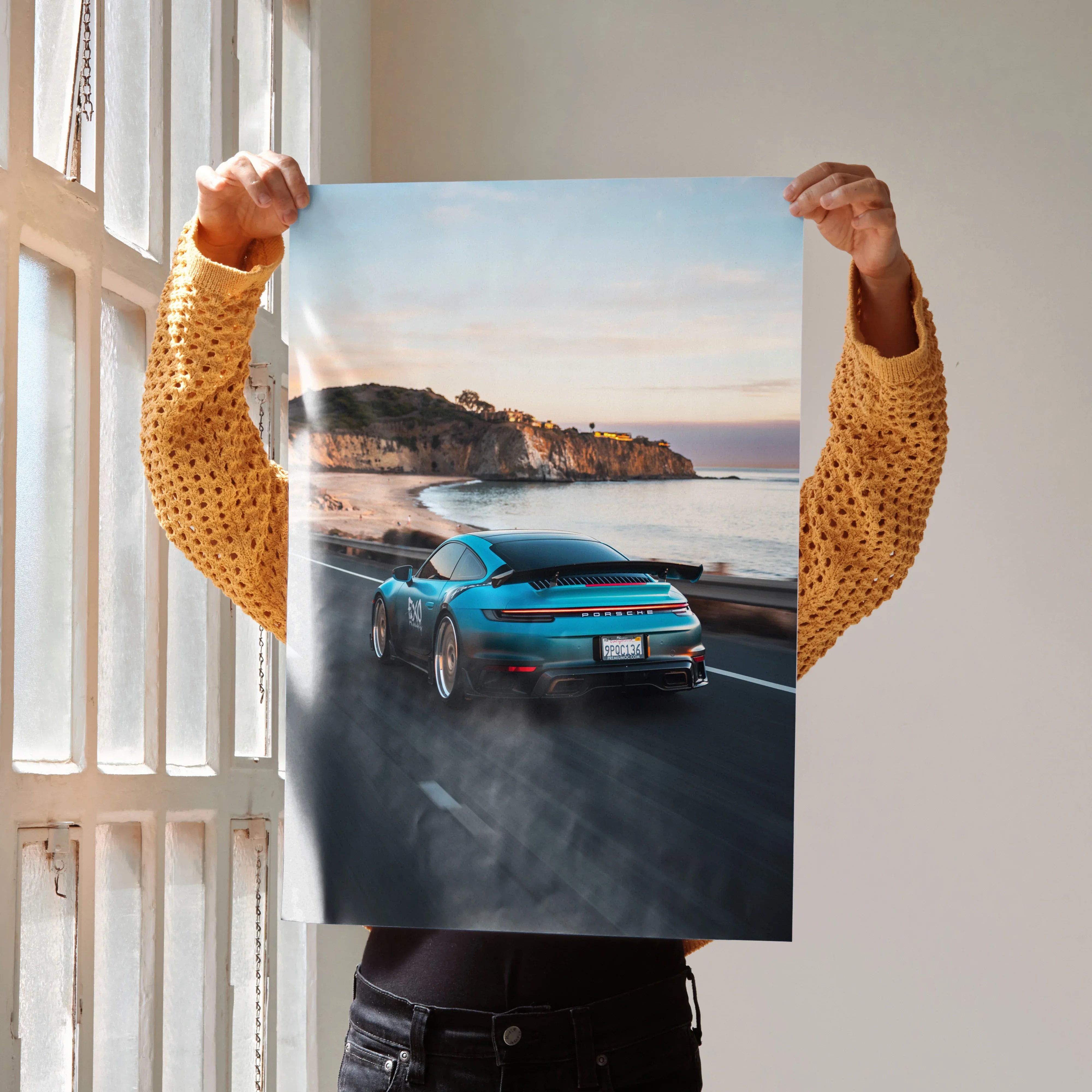 Porsche 911 sports car driving on coastal road at sunset poster wall art.