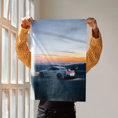 Nissan R35 GT-R parked at sunset in scenic landscape poster wall art.