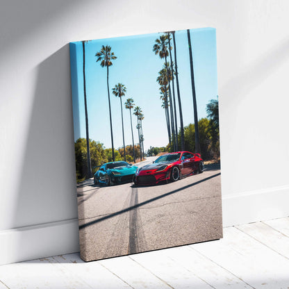 Vertical canvas wall art featuring red and teal Toyota GR86 cars on sunlit palm-lined street.