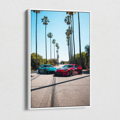 Vertical canvas art of two Toyota GR86 cars on a sunny palm tree-lined street, wall art print.
