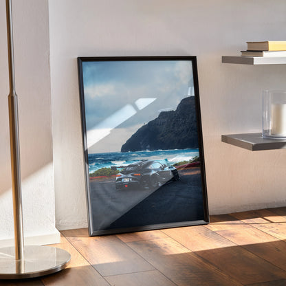 Toyota Supra Mk5 car poster leaning against wall with coastal cliff background wall art.