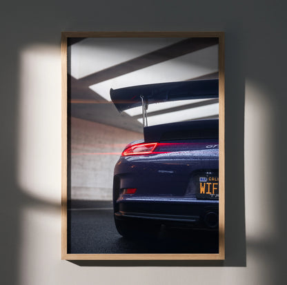 Porsche 911 GT3 RS rear view poster with prominent spoiler in modern garage wall art.