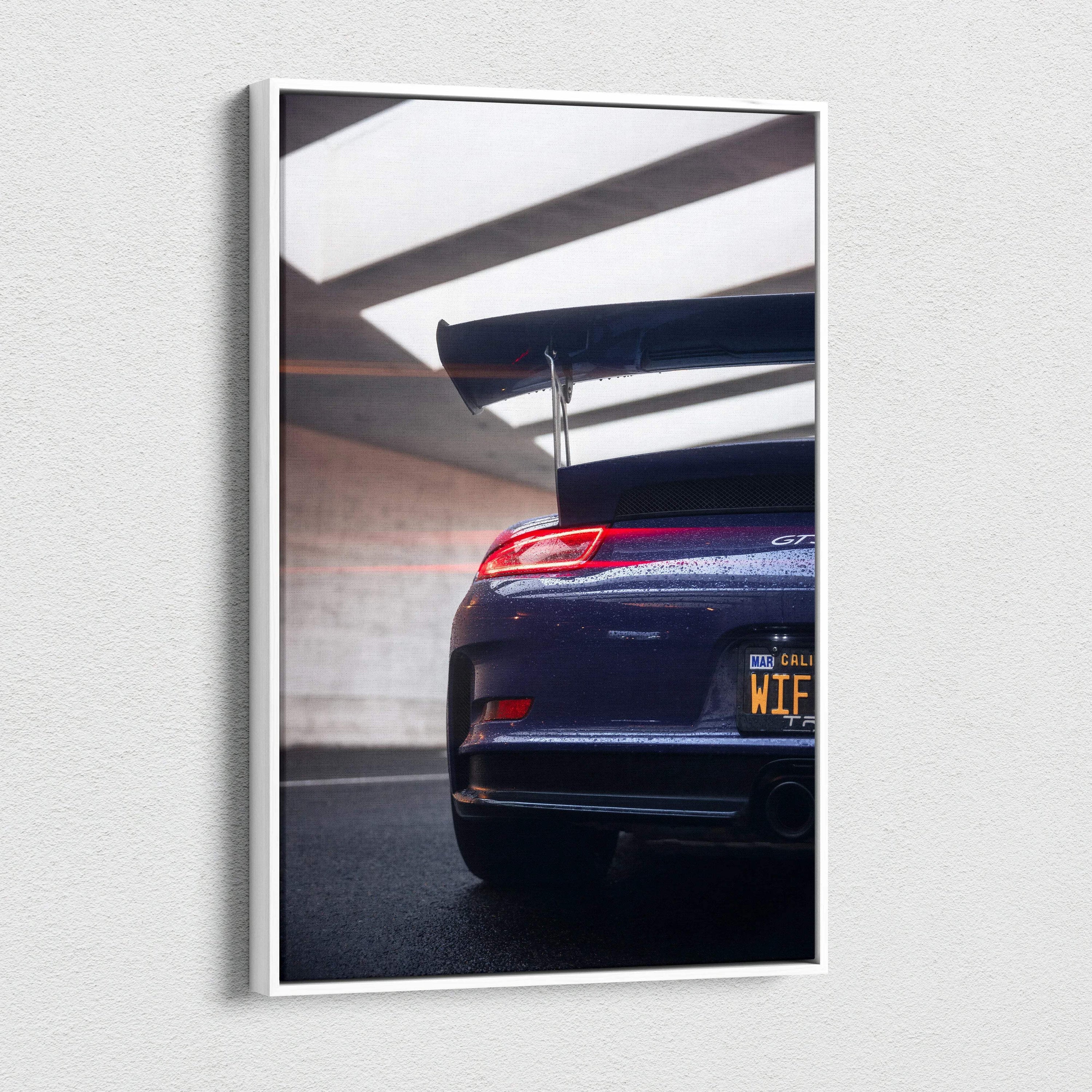 Vertical canvas art of Porsche 911 GT3 RS rear with spoiler in modern parking garage wall art.