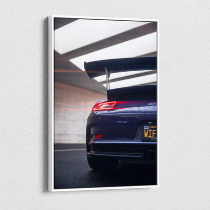 Vertical canvas art of Porsche 911 GT3 RS rear with spoiler in modern parking garage wall art.