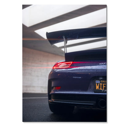 Porsche 911 GT3 RS rear view with prominent spoiler in moody lighting, high-resolution poster wall art.