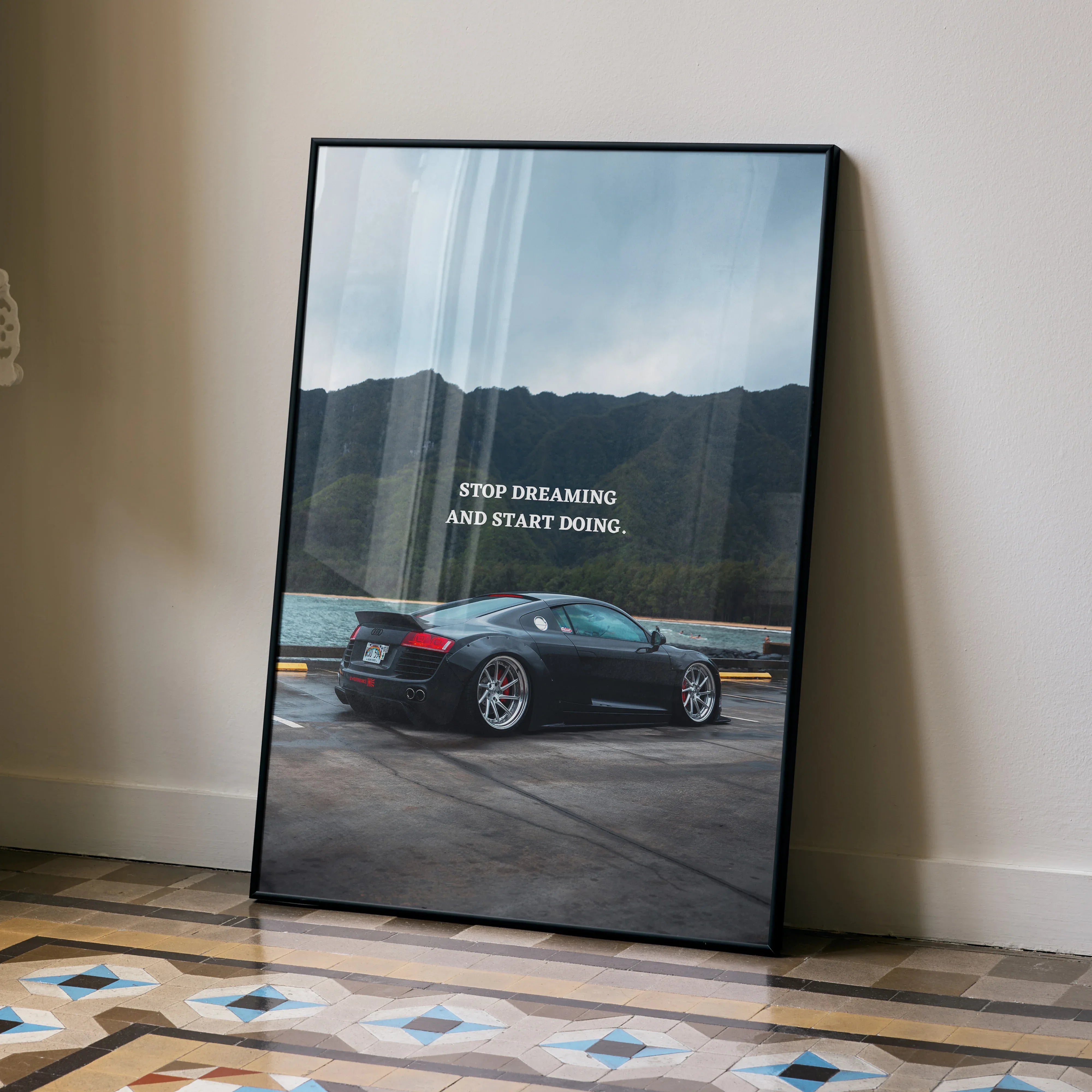 Audi R8 poster wall art with motivational text "Stop dreaming and start doing" against mountain backdrop.
