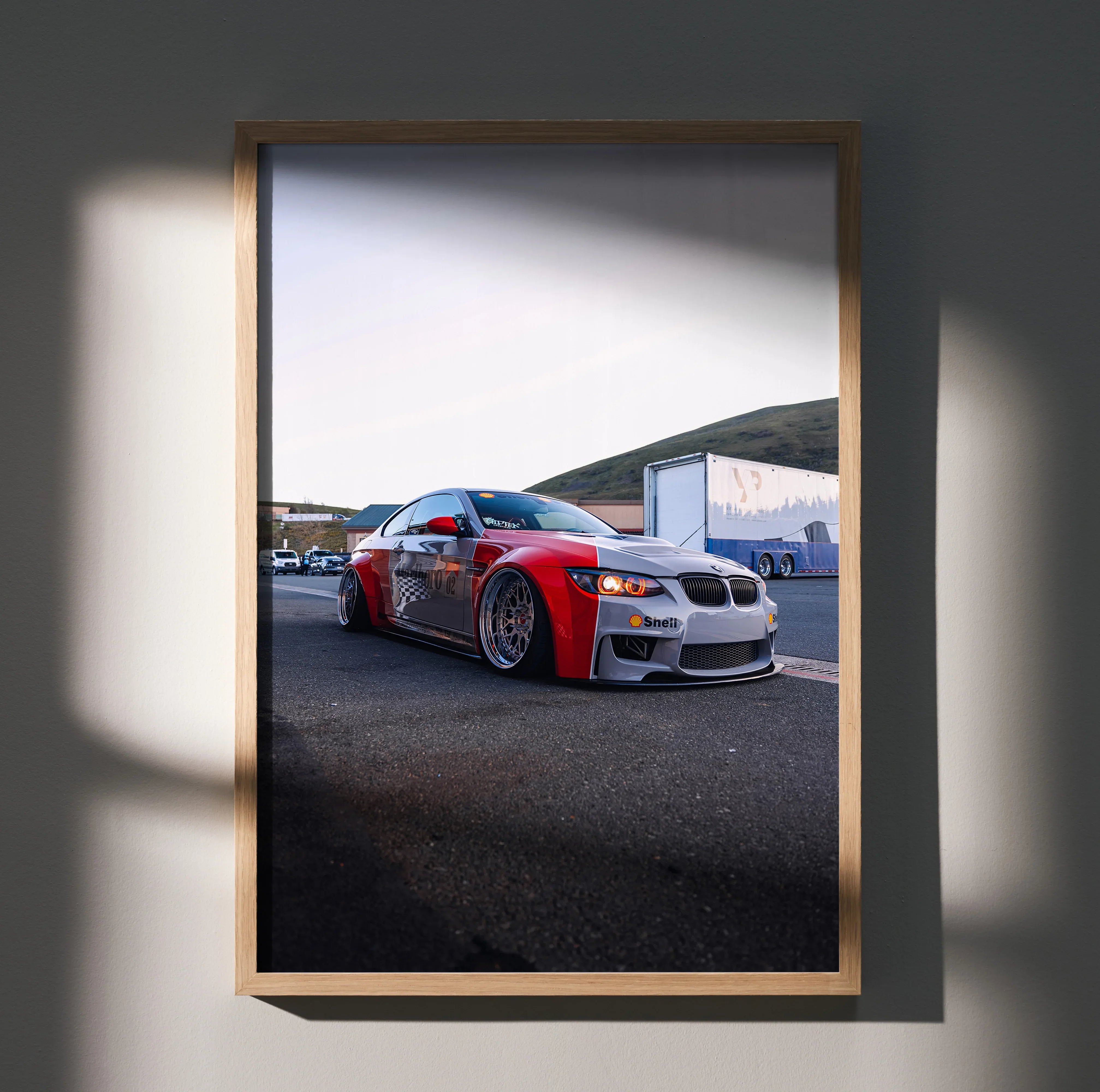 BMW E92 M3 red sports car poster wall art with sleek design in wooden frame.
