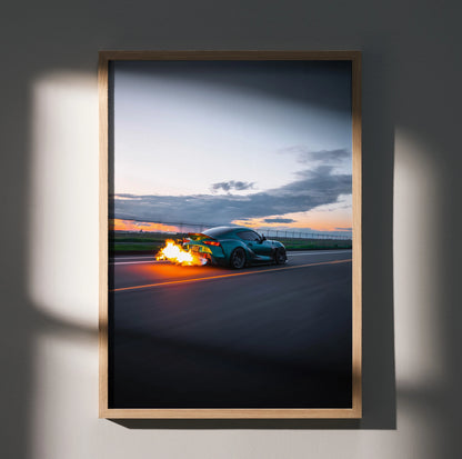 Toyota Supra Mk5 racing at sunset with flames from exhaust, premium poster wall art.