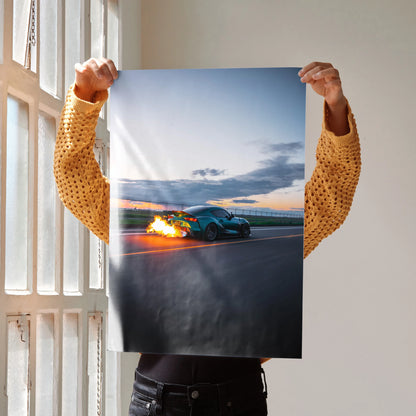 Toyota Supra Mk5 poster with fiery burnout on racetrack, high-resolution wall art for car lovers.