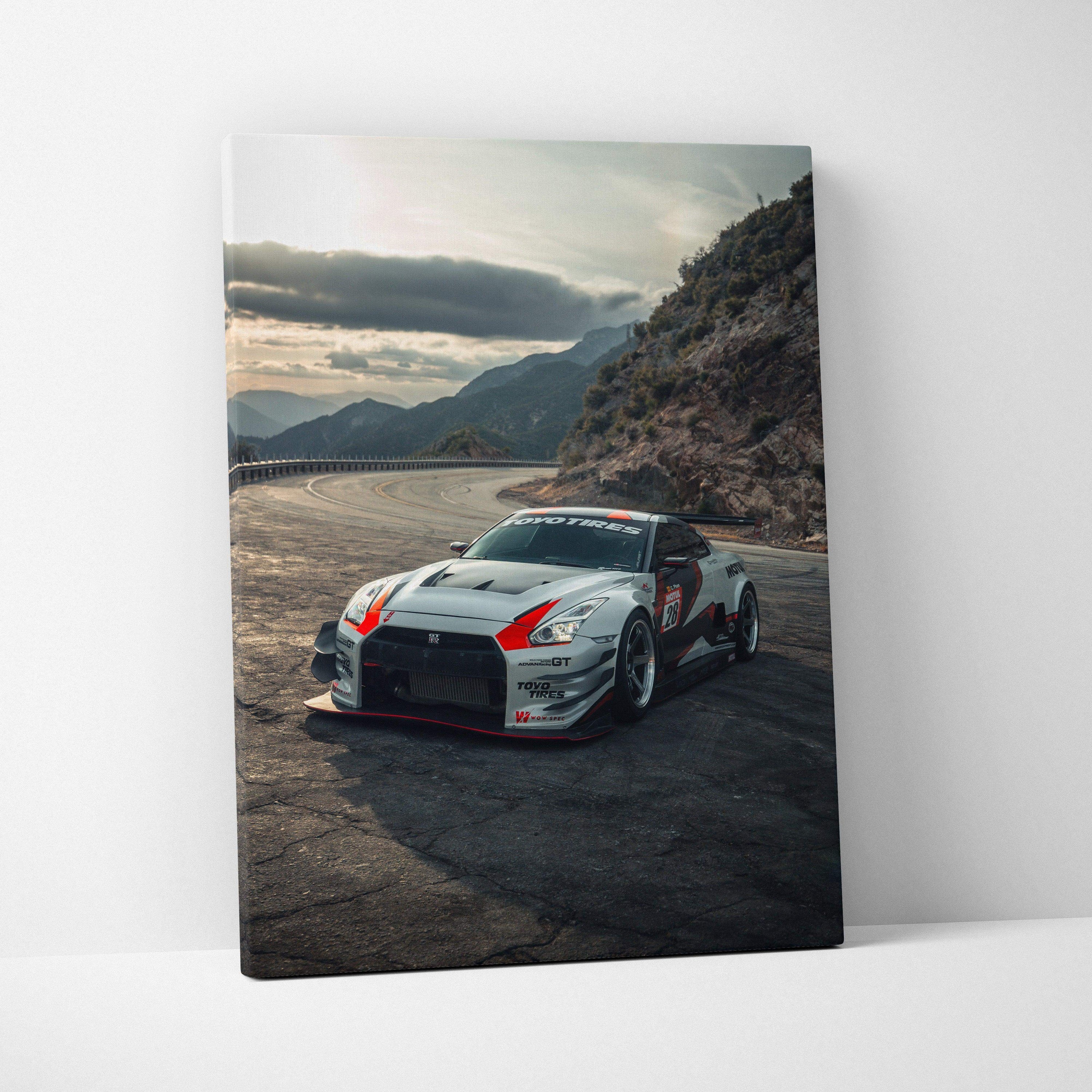 Nissan R35 GTR racing car print on vertical canvas wall art with mountain background.