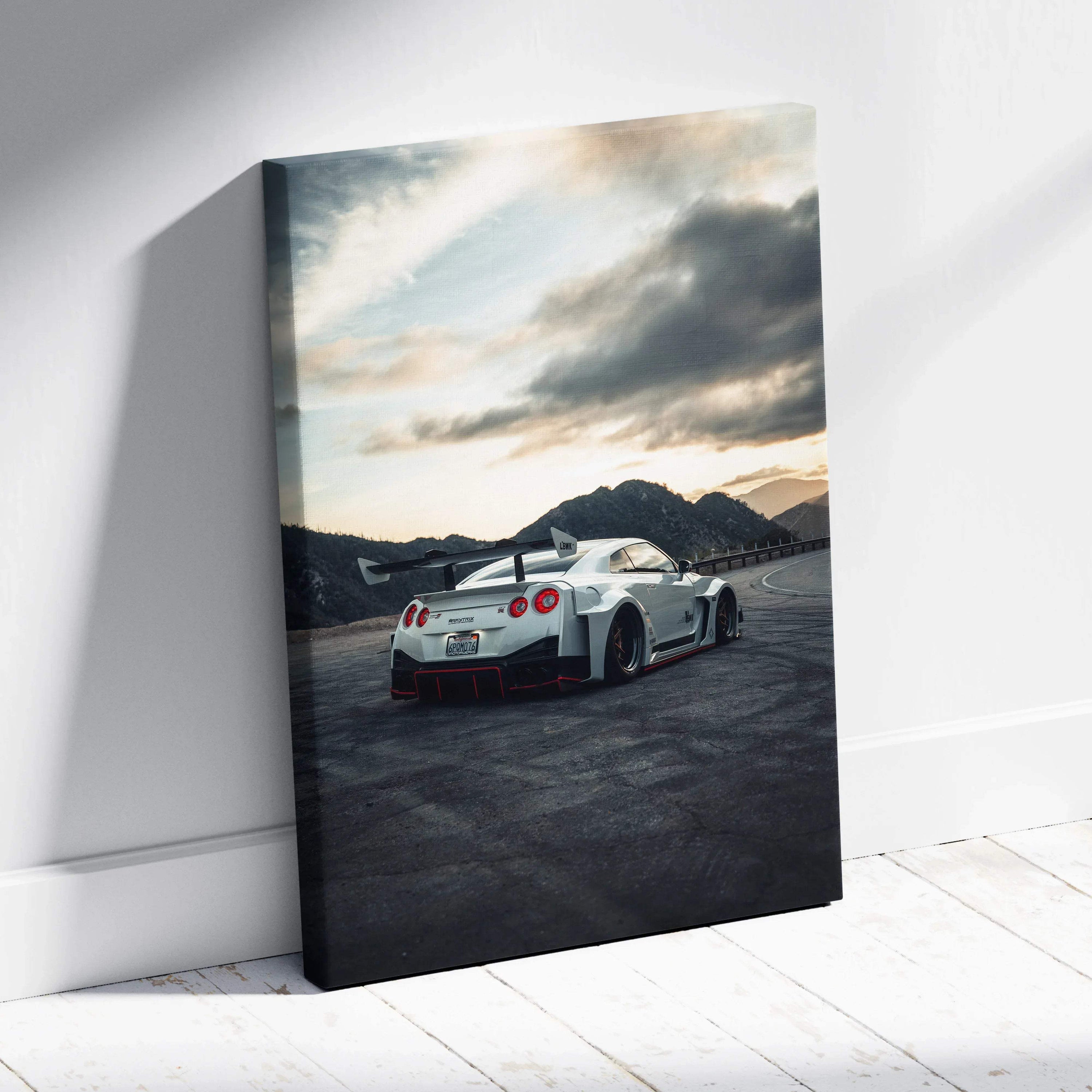 Nissan R35 GTR rear view on asphalt road during sunset canvas wall art.