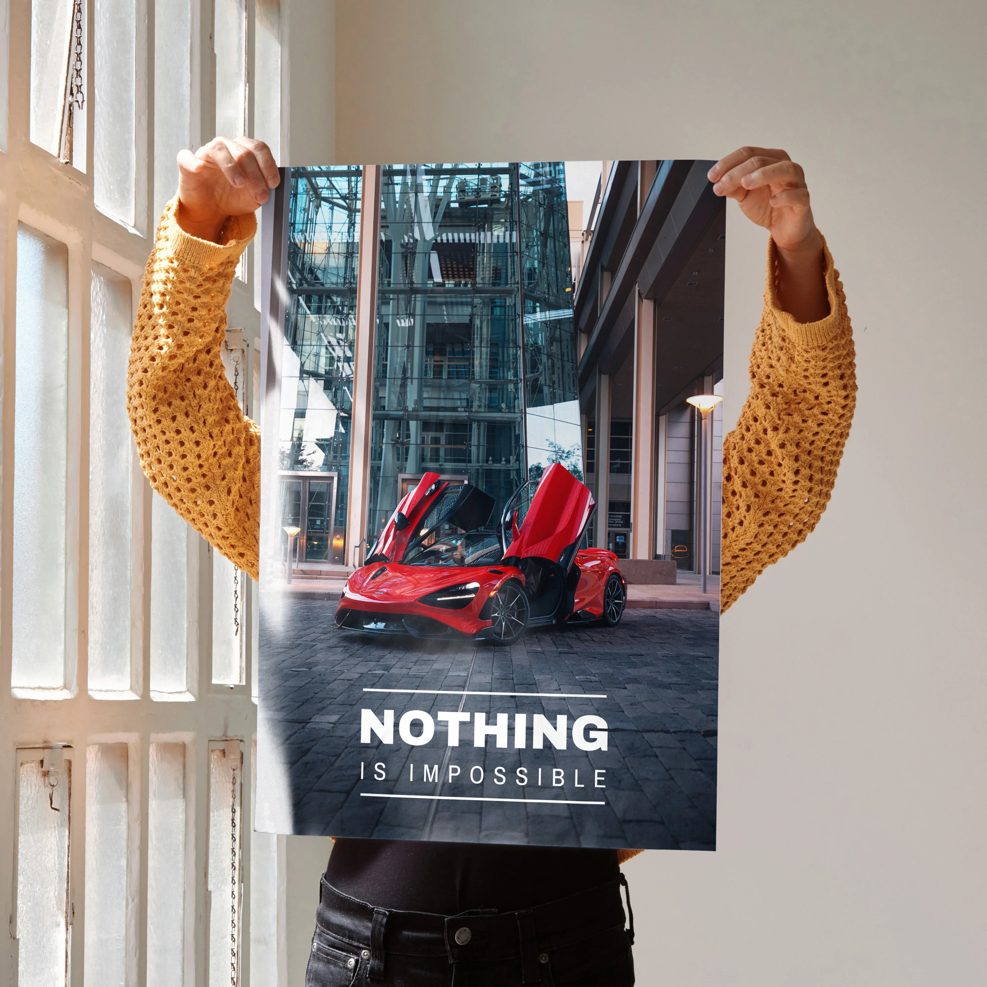 Motivational poster wall art featuring red McLaren 765LT with open doors and inspiring text "Nothing is impossible".