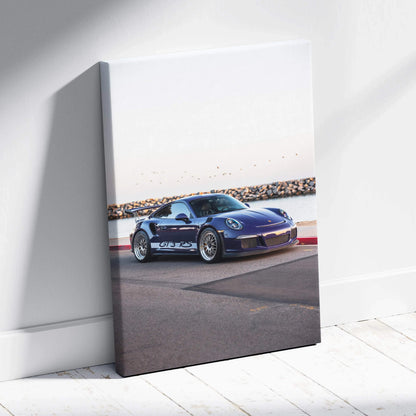 Porsche 911 GT3 RS racing car on track vertical canvas wall art with white background.