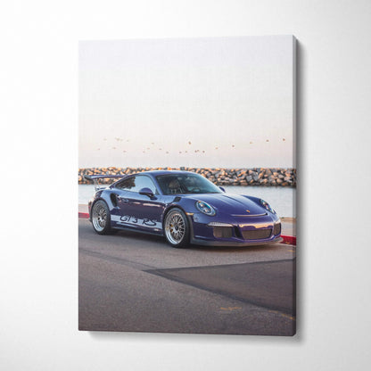 Porsche 911 GT3 RS blue sports car on coastal road canvas wall art vertical print.