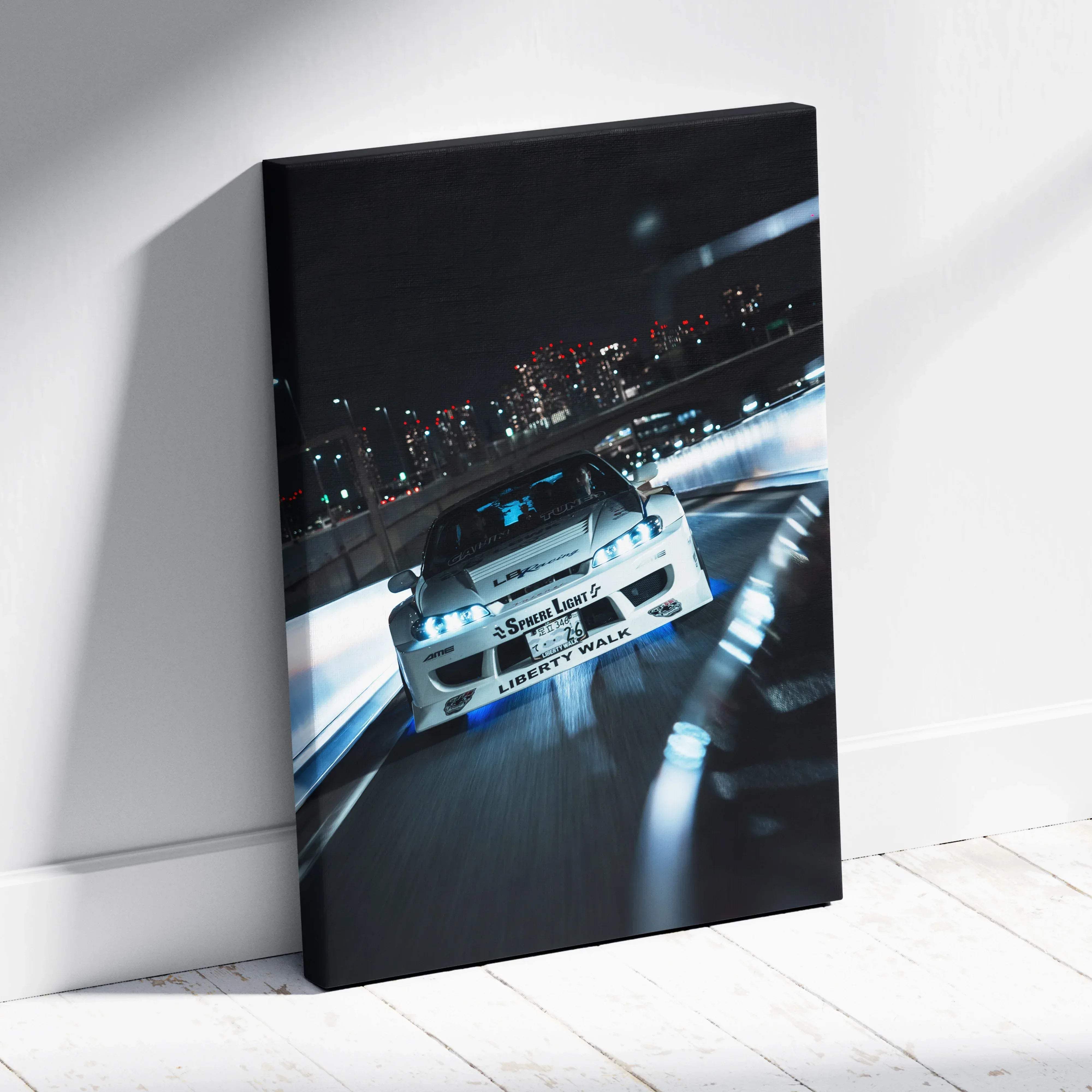 White drift car canvas wall art with glowing blue underglow and city lights motion blur high resolution print
