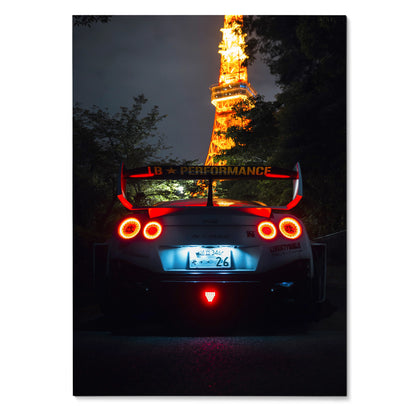 Nissan GT-R R35 rear view at night with illuminated taillights and Tokyo Tower backdrop wall art poster.