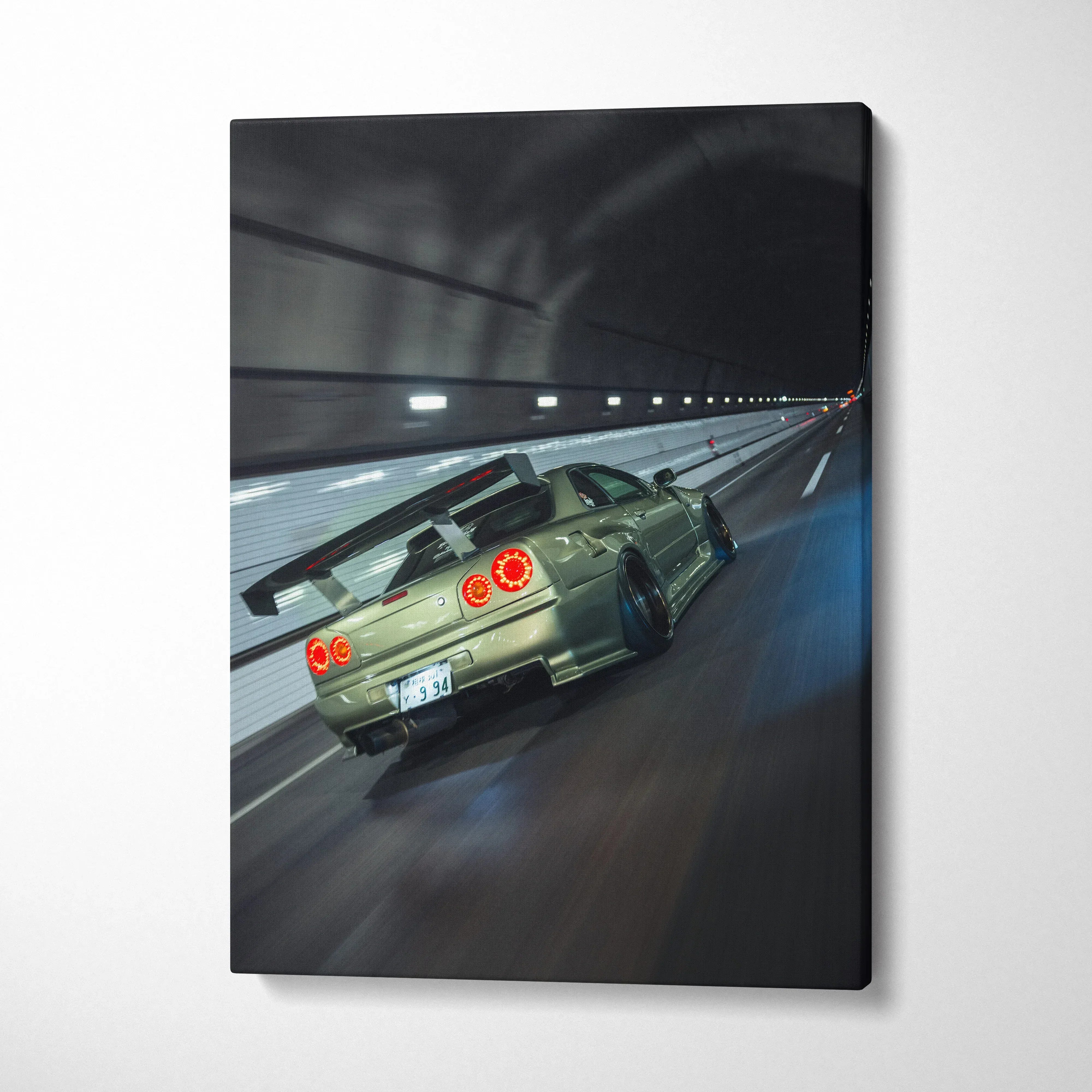Nissan GTR R34 Skyline speeding in tunnel canvas wall art with glossy finish and dynamic motion effect.