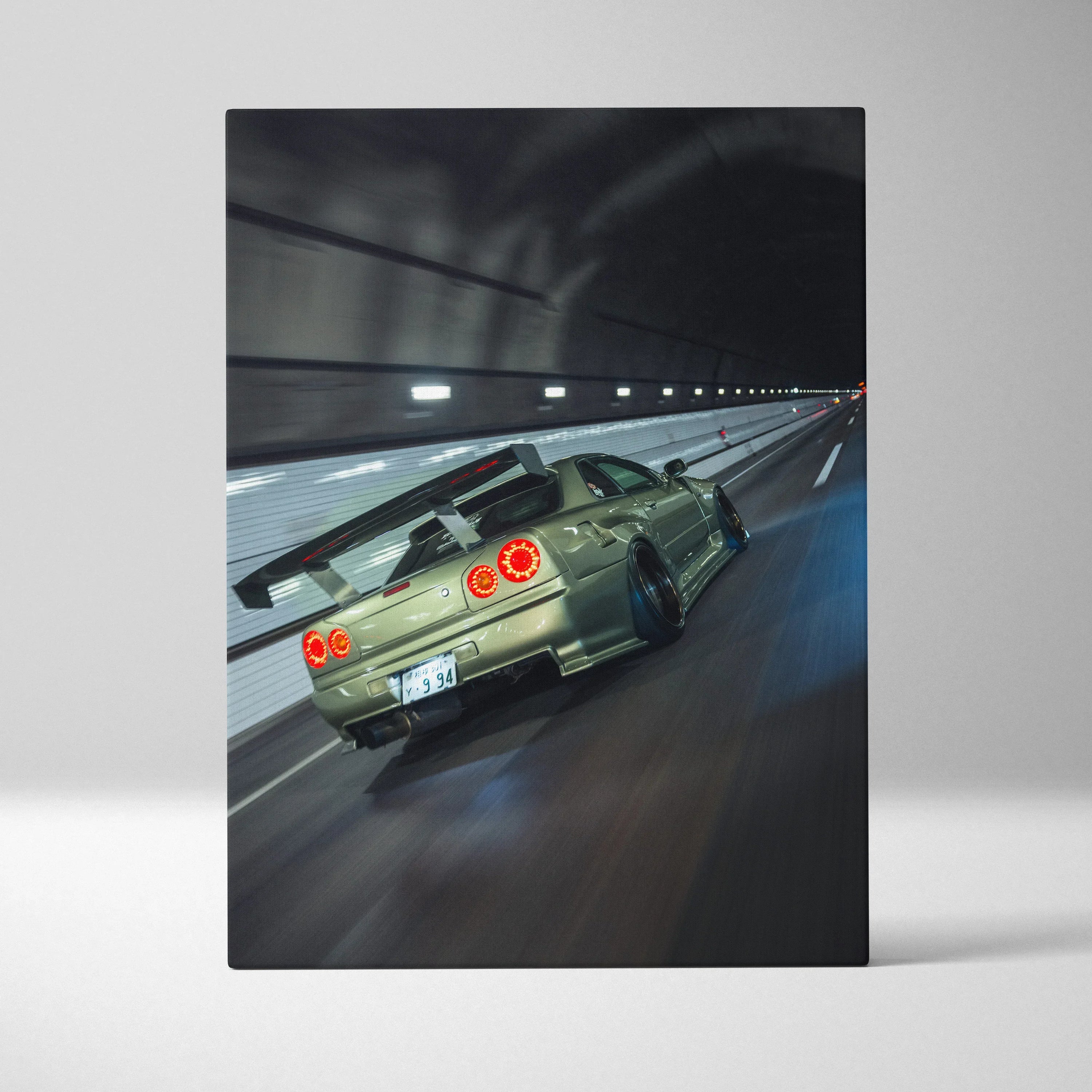 Nissan GTR R34 Skyline speeding in tunnel canvas wall art with dynamic motion blur.