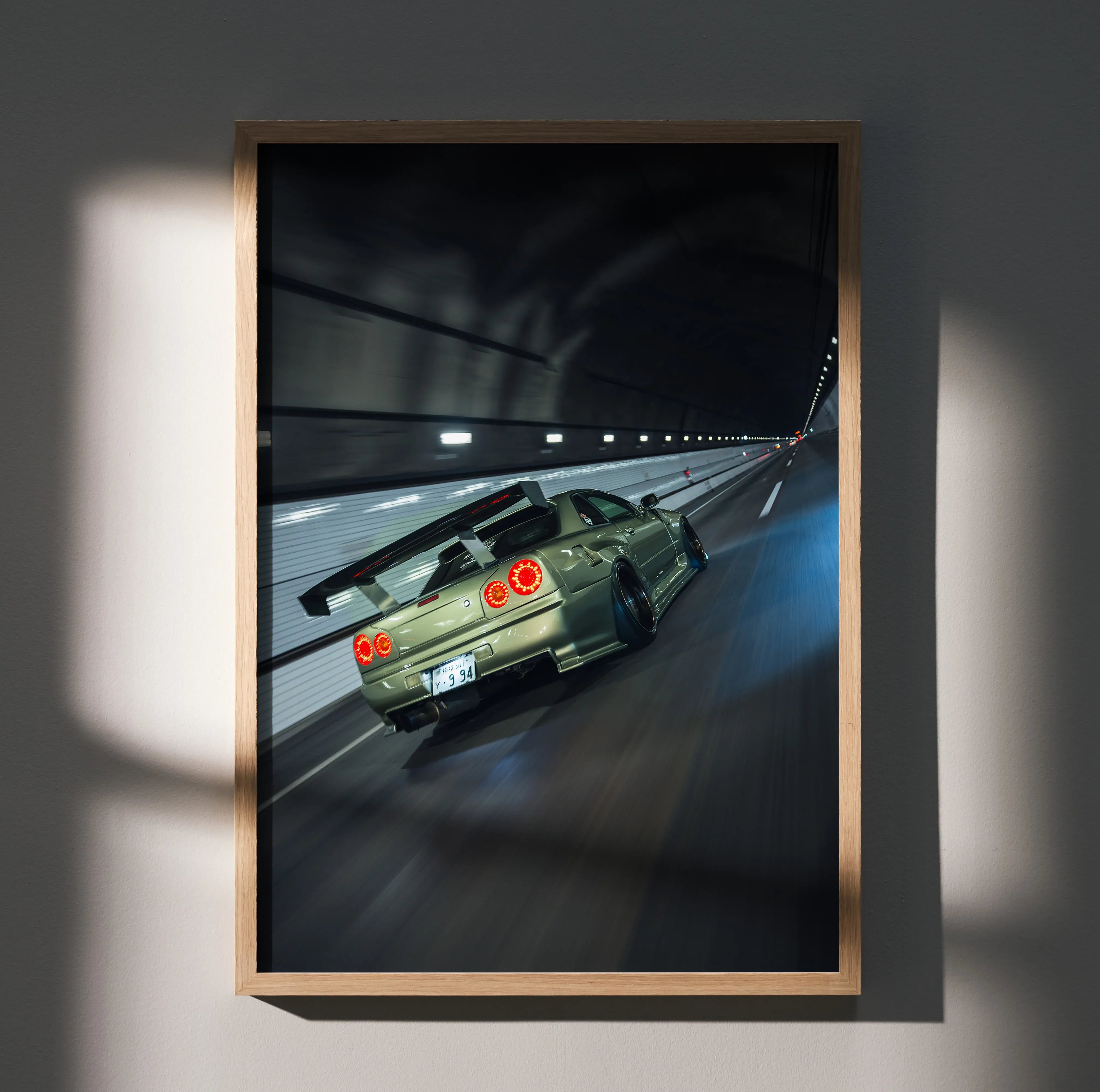 Nissan GT-R R34 Skyline in tunnel wall art poster with dynamic motion blur effect.