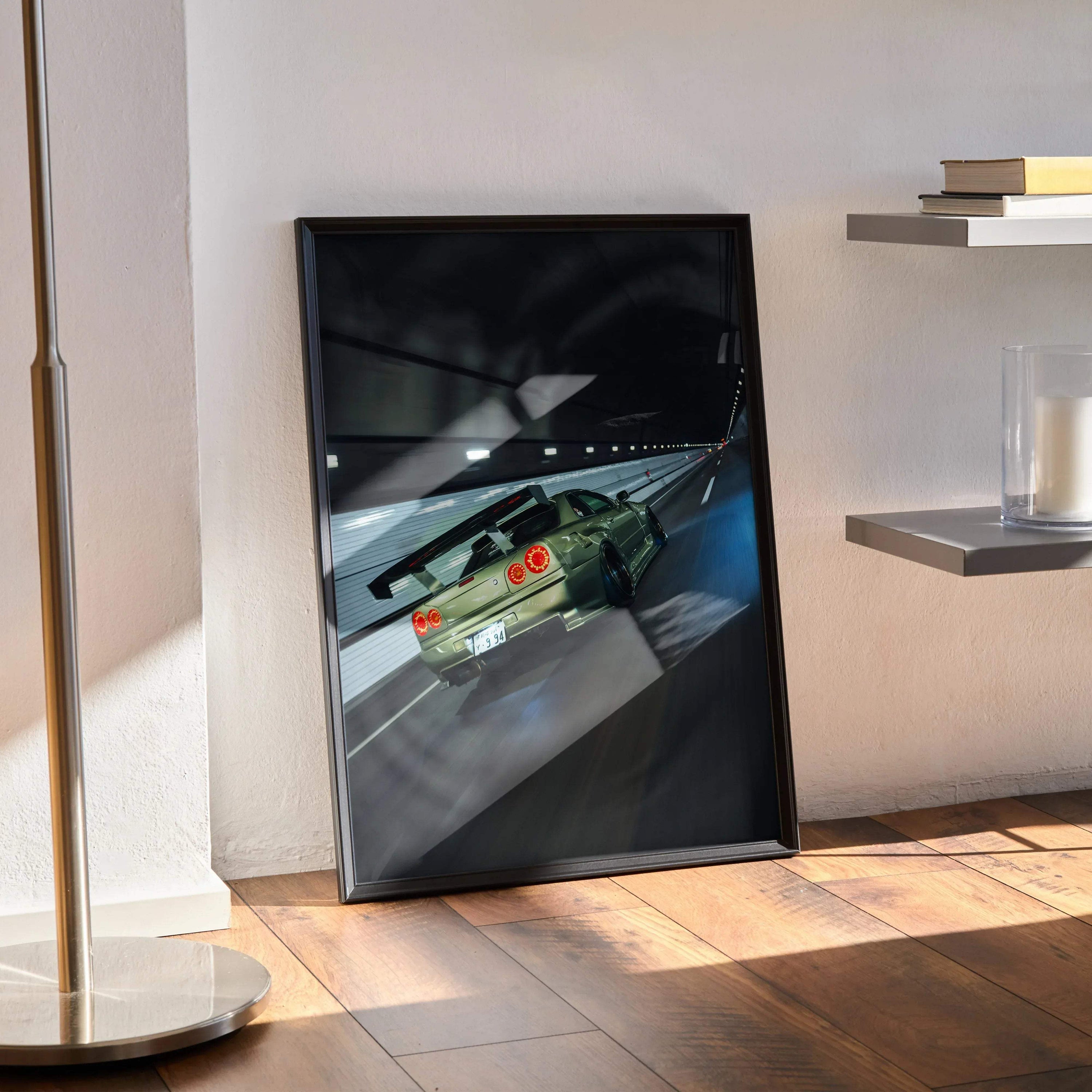 Nissan GT-R R34 Skyline driving on racetrack poster in black frame wall art.