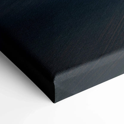 Black textured canvas wrap corner showcasing museum-quality automotive wall art detail.