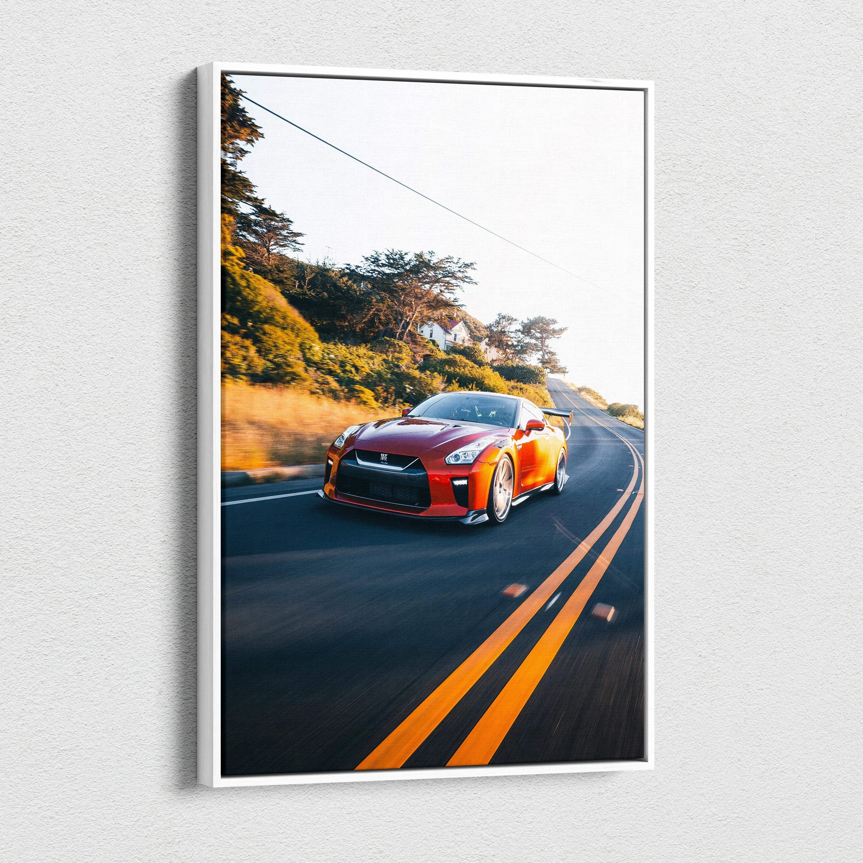 Red Nissan R35 GTR speeding on curved road canvas wall art, vertical car print.
