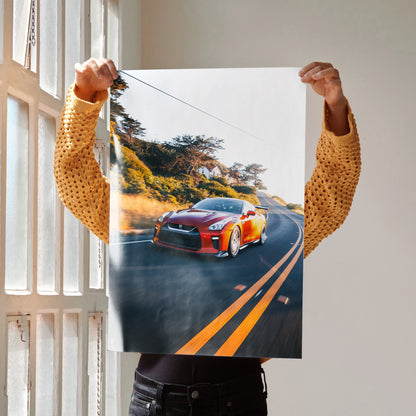 Nissan R35 GTR poster featuring a red sports car on a winding road, vibrant wall art with bold colors.