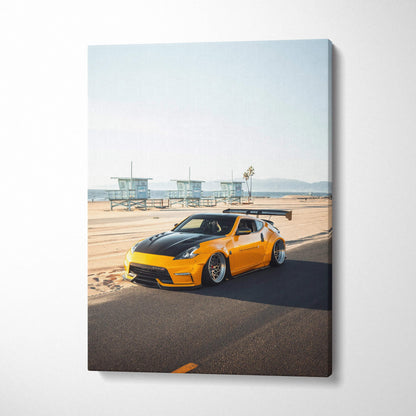 Canvas wall art featuring a yellow Nissan 370z parked on a sunlit coastal road with lifeguard towers in the background.