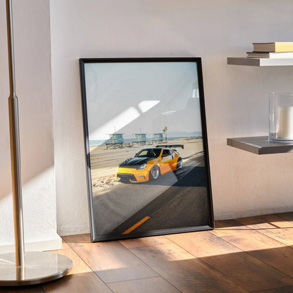 Nissan 370z JDM car poster with orange sports car on coastal road in black frame wall art.