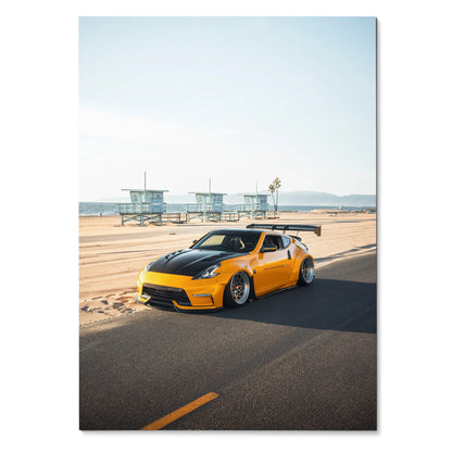 Nissan 370z in bright yellow lowered on coastal road poster wall art.
