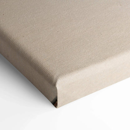 Beige blank canvas wall art with textured surface and wrapped edges.