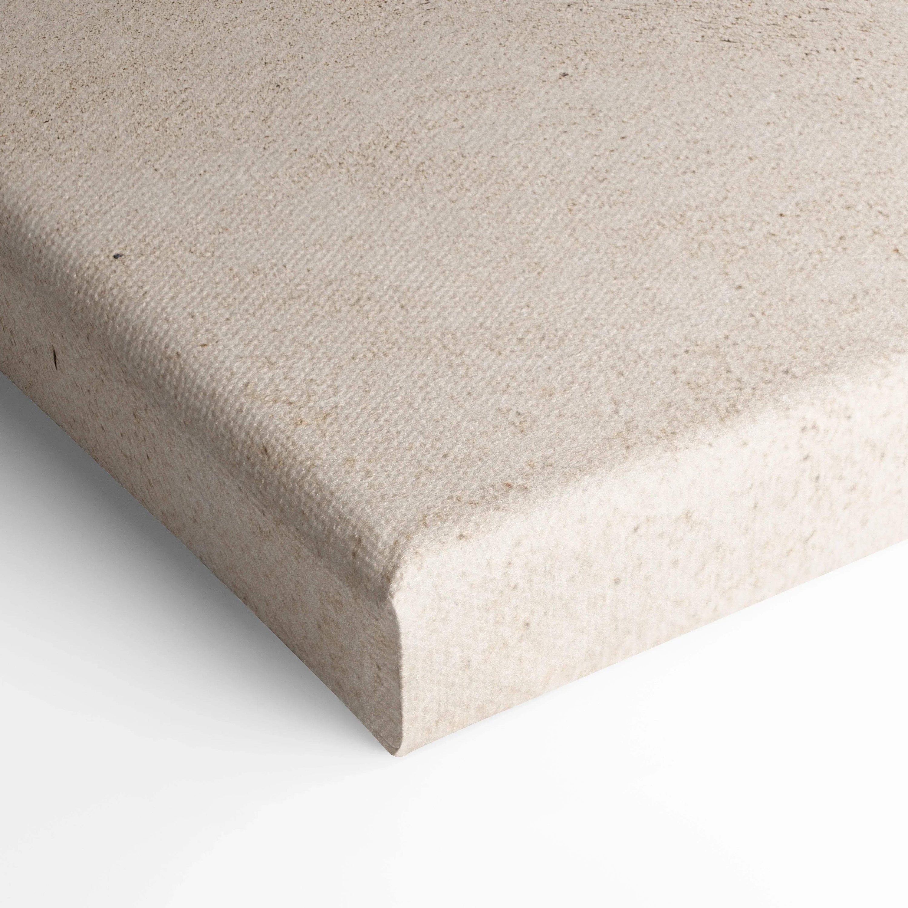 Close-up of textured beige canvas edge for vertical wall art print.