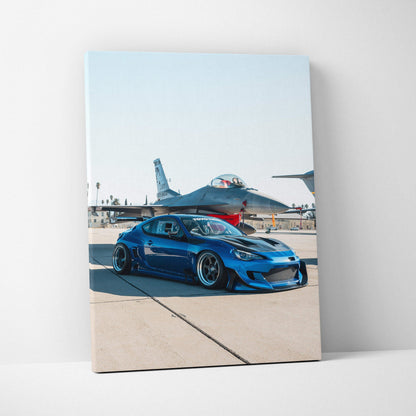 Blue Toyota FRS sports car canvas art with jet plane background vertical wall art.