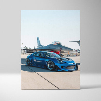 Blue Toyota FRS sports car with fighter jet in background vertical canvas wall art.