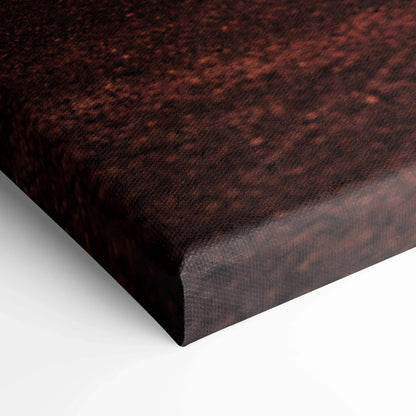 Close-up of textured dark red and black Nissan R35 GTR canvas art corner with visible wrap, vertical wall art detail.