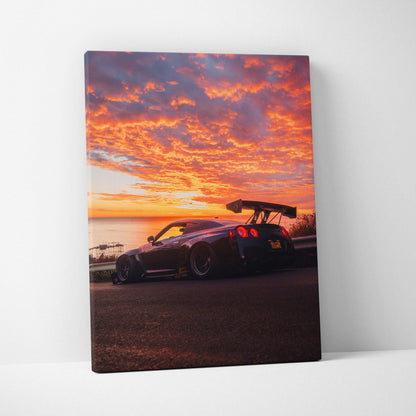 Nissan R35 GTR sports car against vibrant orange sunset sky canvas wall art in vertical format.