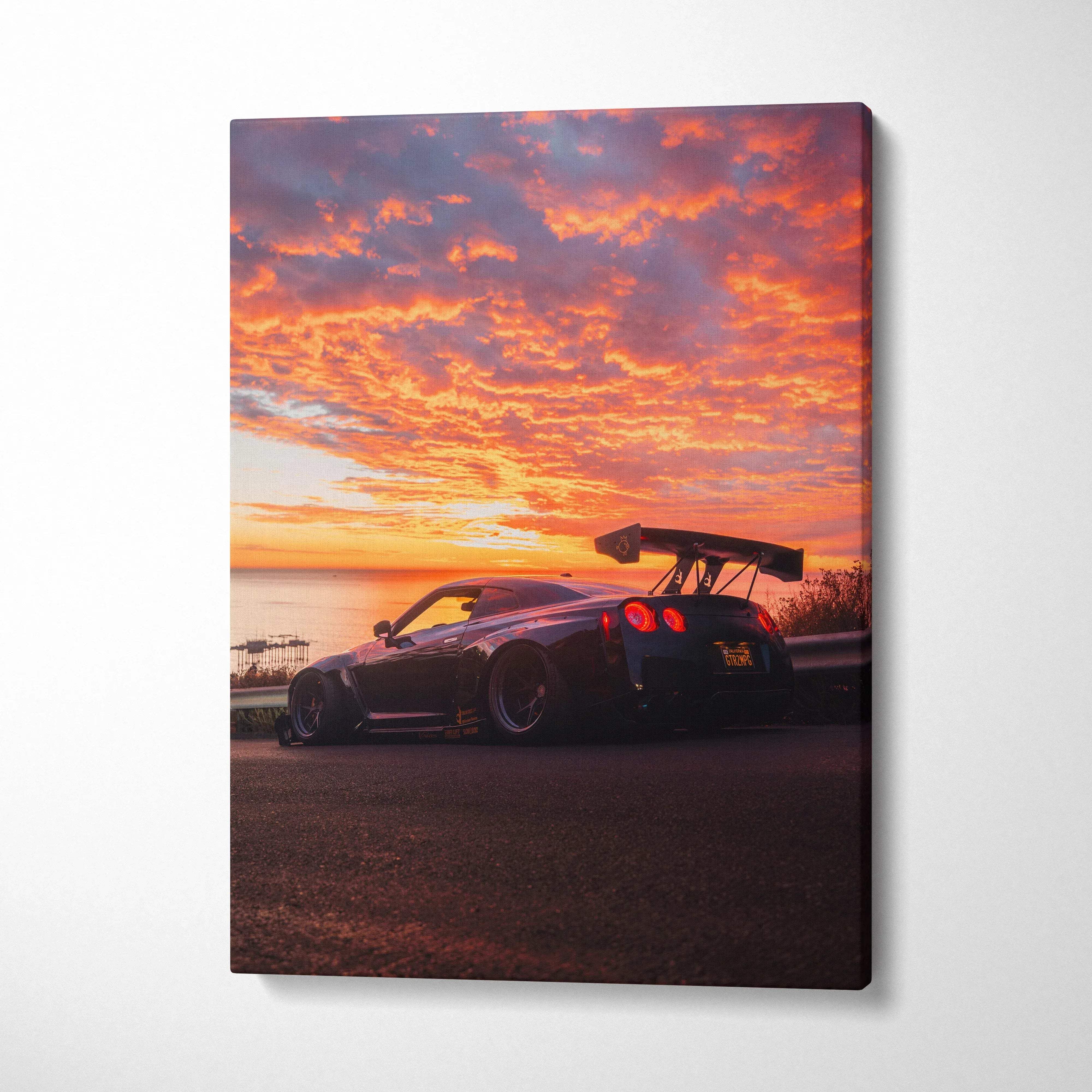 Nissan R35 GTR silhouette against vibrant orange sunset sky canvas wall art.